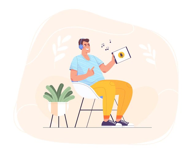 Flat happy teen in headphones sitting at home in chair and using tablet for online self education. smiling man relaxing and listening to music, radio, lecture, podcast or digital audiobook on device.
