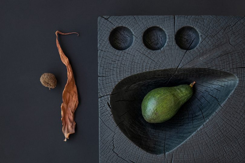 styled black hand-carved solid cedar wood bowl