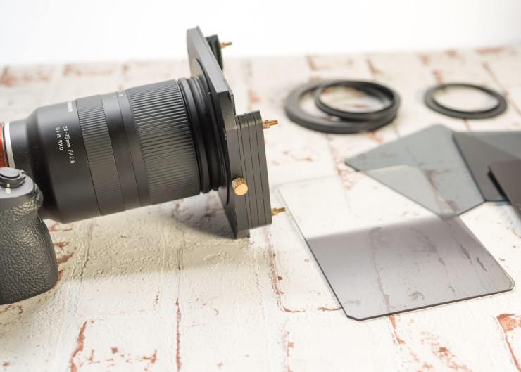 The filter holder screws onto your lens