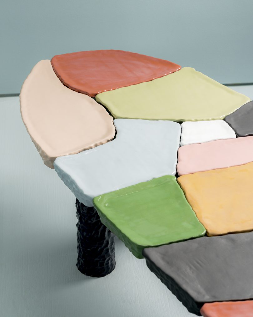 detail of colorful mosaic clay coffee table
