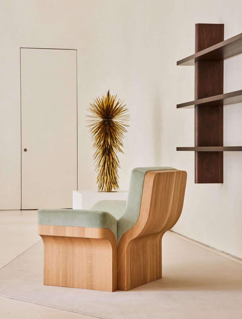 chair, sculpture, wall shelves