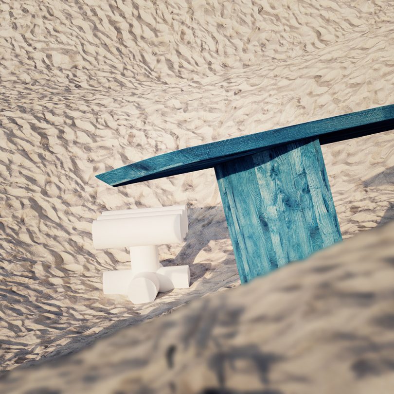 chair and table in sand dune