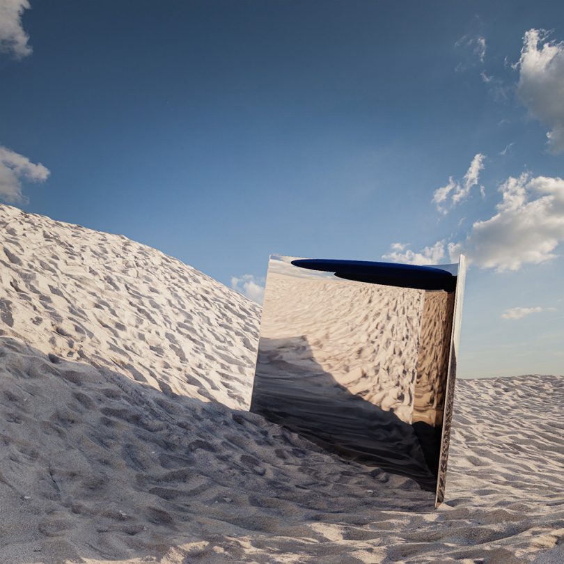 metallic object in a sand dune