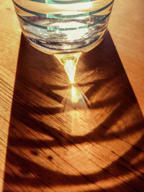 practice water glass shadow on table