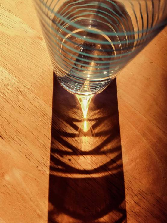 practice water glass shadow on table