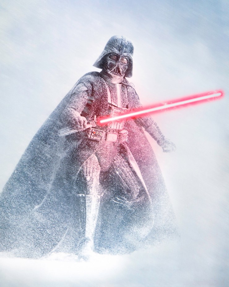 Darth Vader with light sabre in a snow storm. Toy photography at its best.