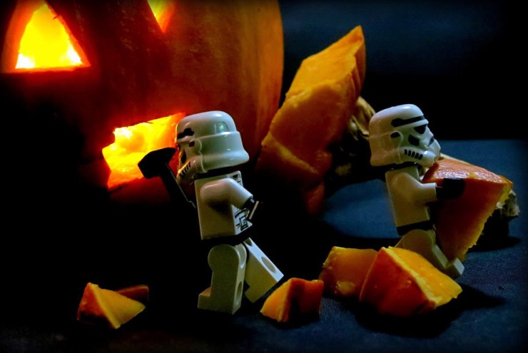 Storm troopers with pumpkin.
