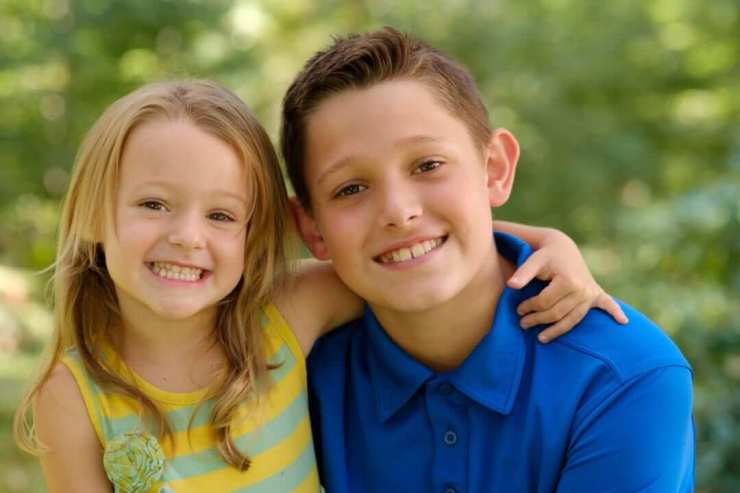 Smiling young boy and girl