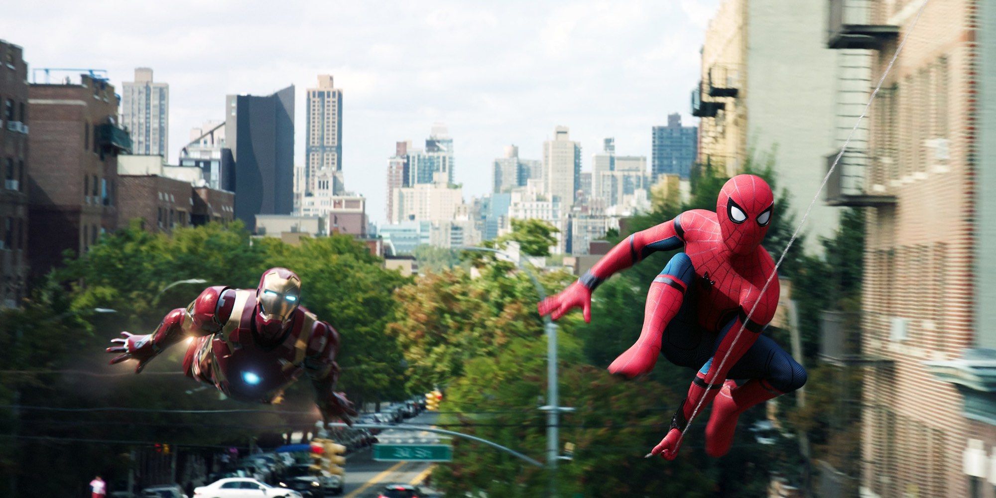 Spider-Man and Iron Man fly together in a cut scene from Spider-Man: Homecoming
