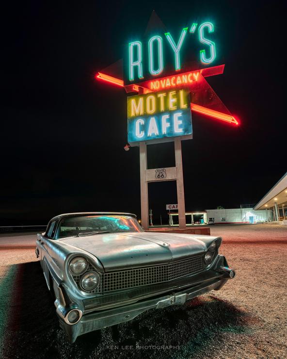 A night scene with an enormous dynamic range. This is the iconic Roy's Motel and Cafe sign along historic Route 66 in Amboy, California, located in the Mojave Desert.