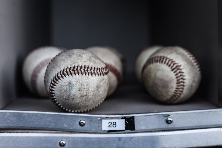 baseballs in dugout