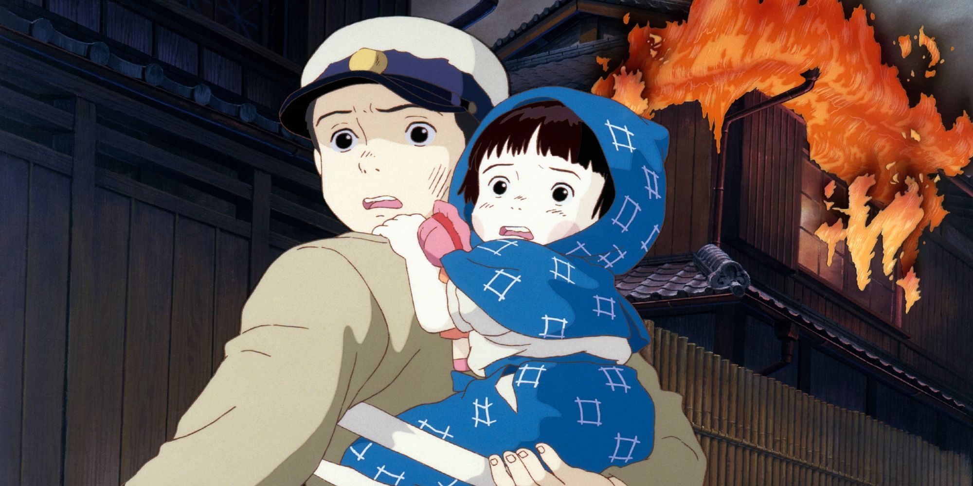 Seita carrying Setsuko, both looking frightened in Grave of the Fireflies