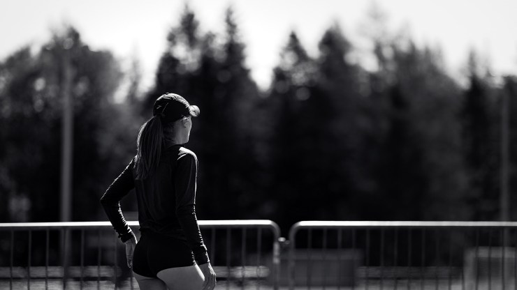 Female runner B&W blurred background