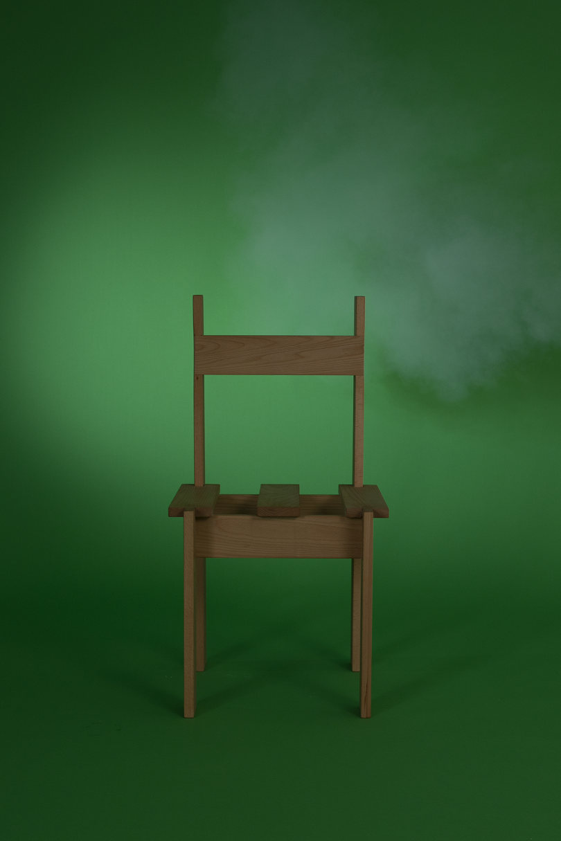 dining chair on dark green background with white smoke