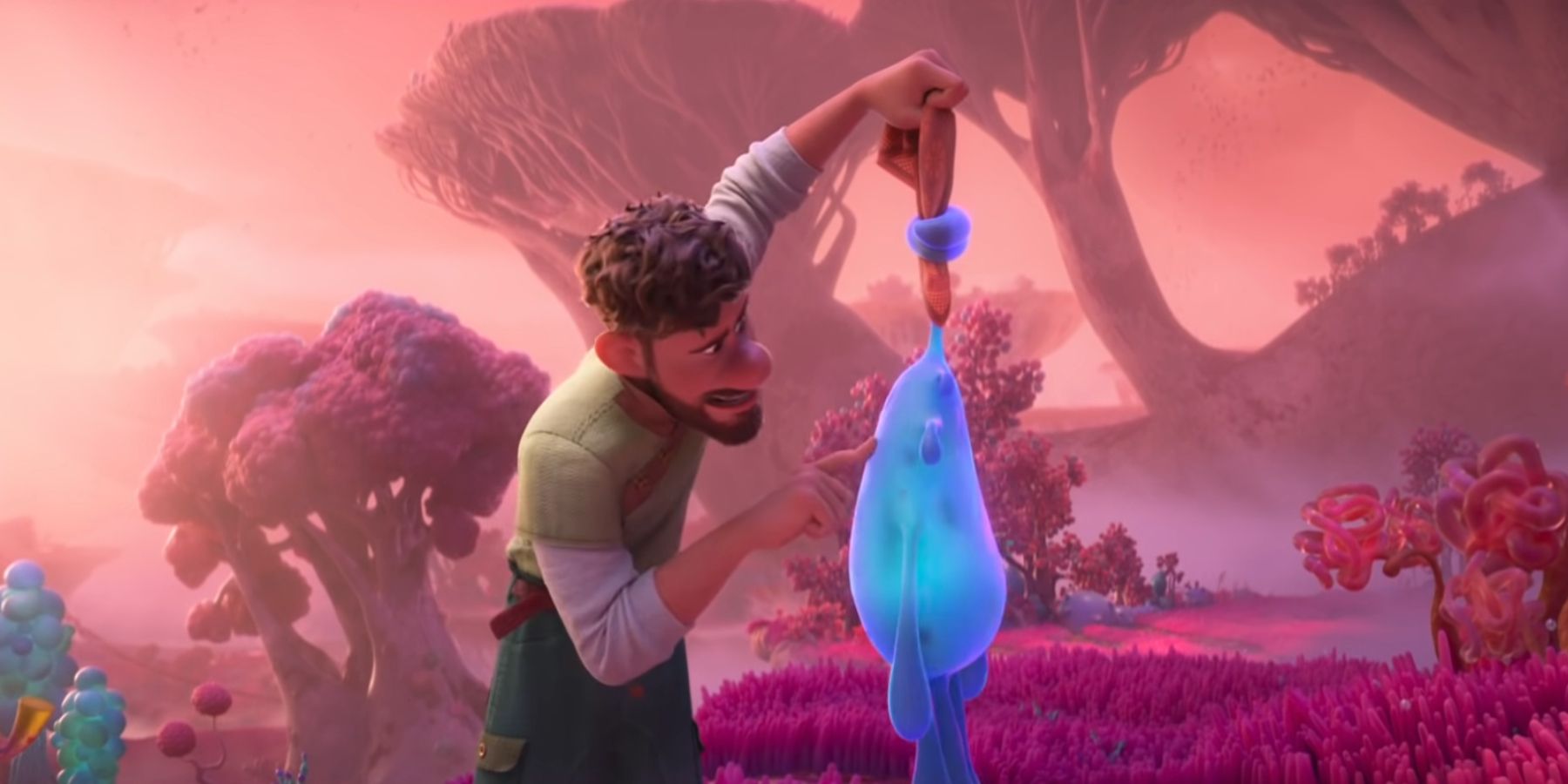 A character prods a blue alien in Disney's Strange World