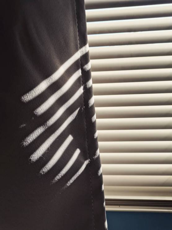 blind shadows on curtain