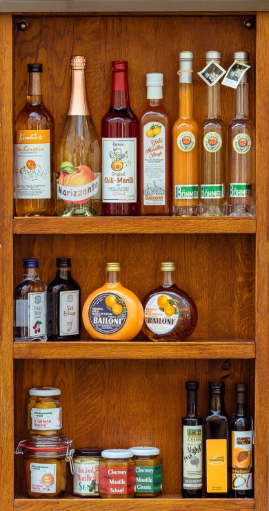apricot brandy, wine, and other assorted products