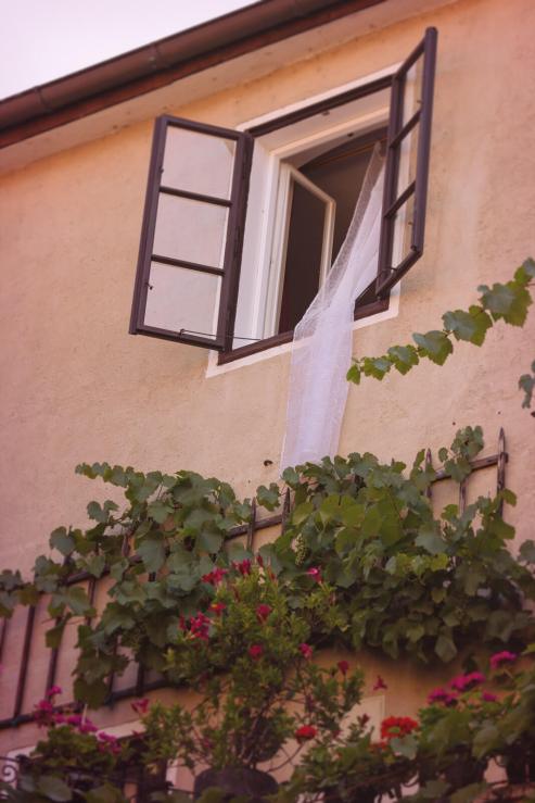 flowing drapes out of window in Durnstein
