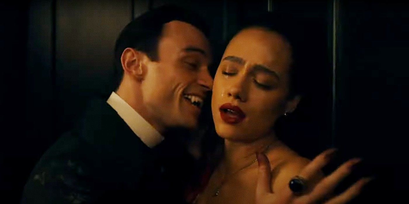 A vampire leans in to bite Nathalie Emmanuel neck in The Invitation